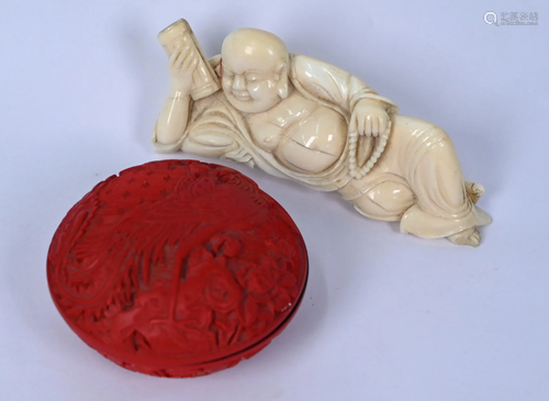 A Chinese ivory carving of Budai to/w a cinnabar red