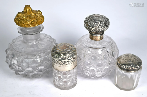 Silver-mounted tioilet bottles & ormolu -topped cologne