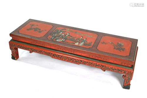 A Chinese red lacquer kang table