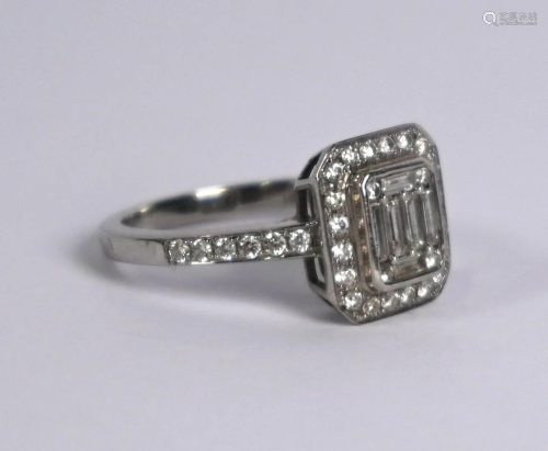 A rectangular diamond cluster ring