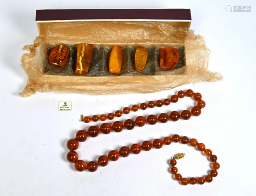 Amber necklace and loose specimens
