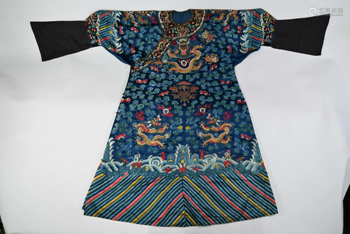 A Chinese blue ground nine dragon robe, late Qing