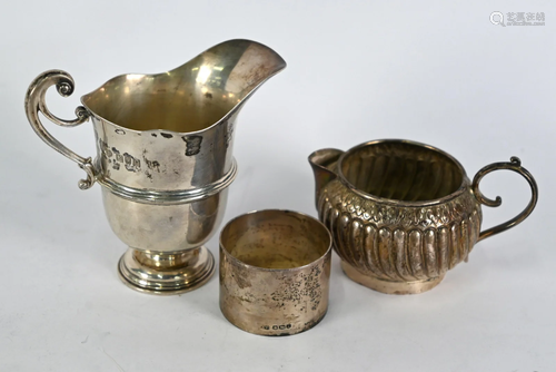 Two silver jugs & napkin ring