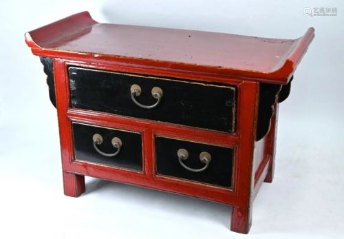 A small Chinese red and black lacquered altar top chest