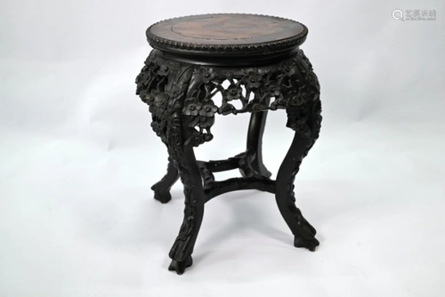 An antique Chinese hardwood jardiniere stand