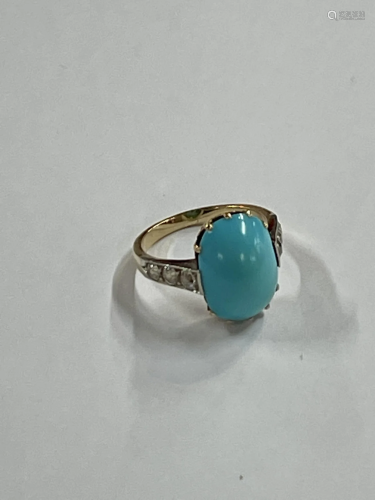 A turquoise and diamond ring