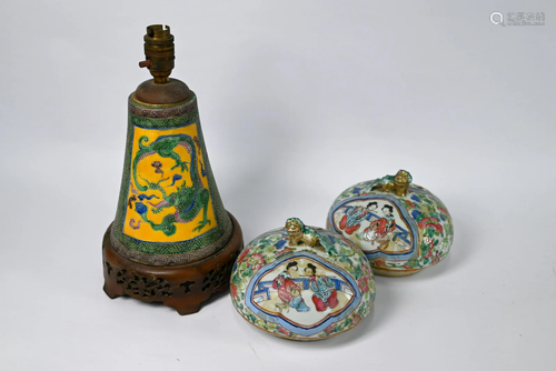 A Chinese polychrome dragon lamp and pair of famille