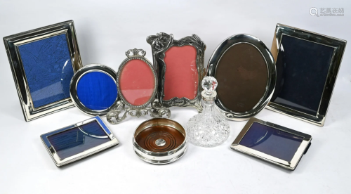 Four silver-mounted photograph frames, etc.