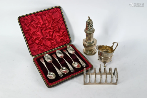 Silver teaspoons, toast-rack, caster and jug
