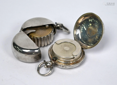 Two silver sovereign cases