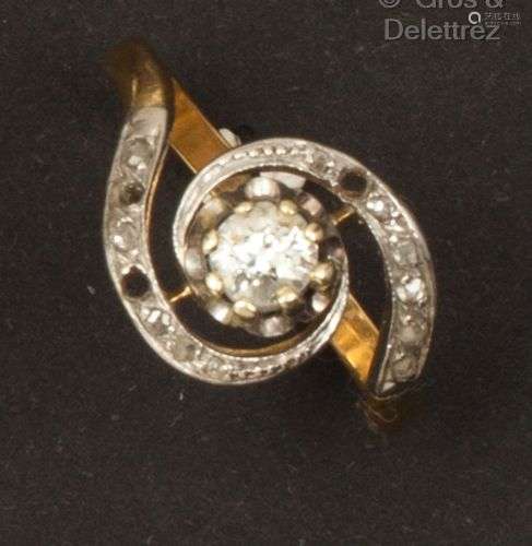 Bague « Tourbillon » en or jaune et platine, ornée d’un diam...