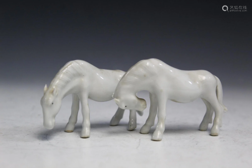 Two Chinese Blanc de Chine Porcelain Horse Figurines.