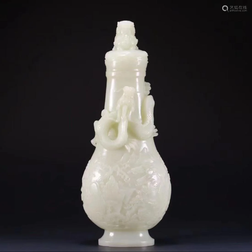 CHINESE WHITE JADE CARVING OF DRAGON LIDDED VASE