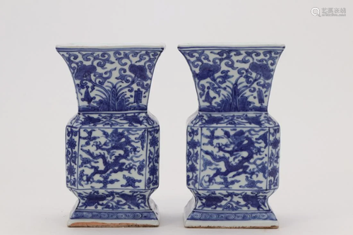 A PAIR OF BLUE AND WHITE 'DRAGON' GU VASES