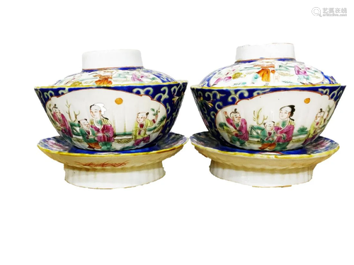 A BLUE GROUND FAMILLE ROSE 'FIGURE' BOWL AND COVER