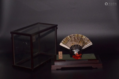 A SILVER 'BAMBOO AND FLOWER' FOLDING FAN