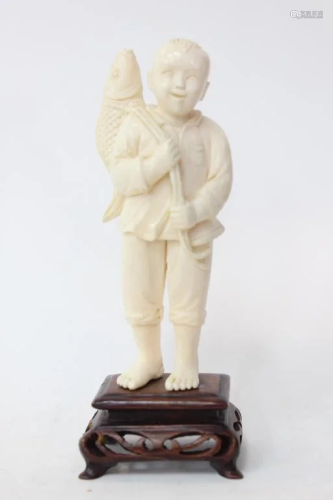 Bone Carved Boy Carry a Fish