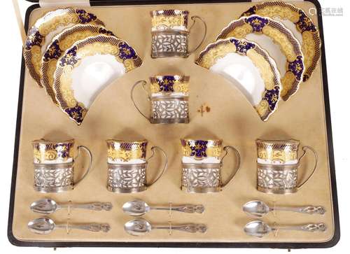 AN EARLY 20TH CENTURY AYNSLEY SILVER MOUNTED CASED COFFEE SE...