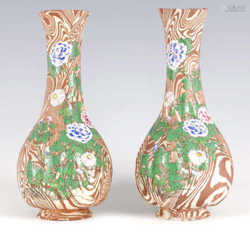 A PAIR OF MEIJI PERIOD JAPANESE MARBLED BISC POTTERY NERIAGE...