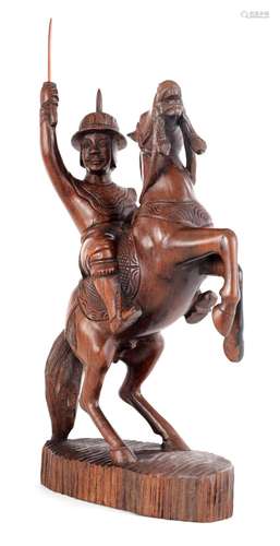 A CHINESE CARVED HARDWOOD FIGURE OF A GENERAL ON HORSE BACK