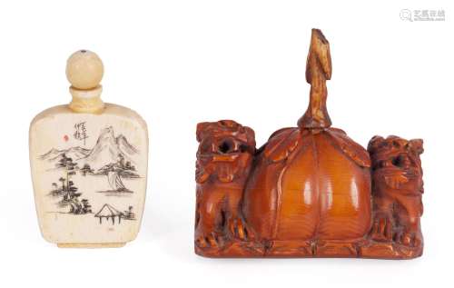 † A 19TH CENTURY CHINESE STAINED IVORY TABLE SNUFF BOTTLE