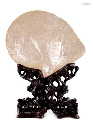 A LATE 19TH CENTURY CHINESE CARVED SHELL ON HARDWOOD STAND