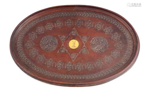 A 19TH CENTURY ANGLO INDIAN CARVED HARDWOOD OVAL TRAY