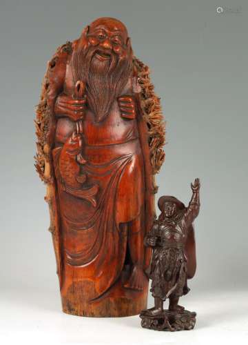 A 19TH CENTURY CHINESE CARVED BAMBOO ROOT FIGURE OF A SAGE