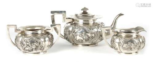 AN EARLY 20TH CENTURY CHINESE SILVER THREE PIECE TEA SERVICE