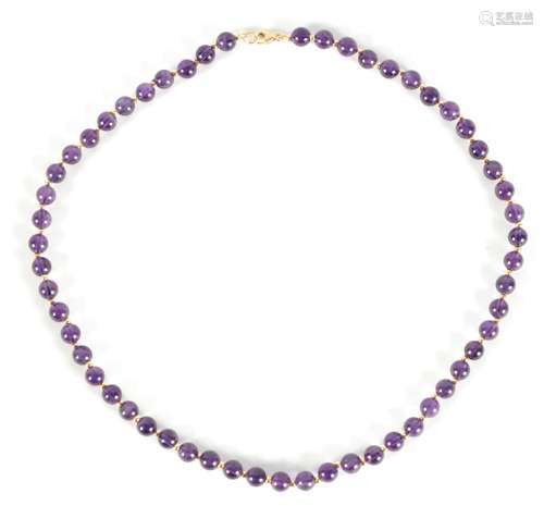 A LADIES 14CT GOLD AMETHYST BEADED NECKLACE