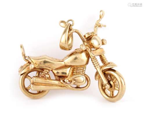 A VINTAGE 9CT GOLD MOTORCYCLE PENDANT