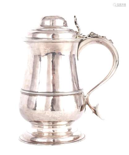 A GEORGE III PLAIN SILVER QUART TANKARD