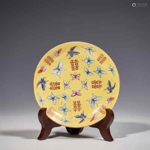 Yellow enamel butterfly design plate with happy character