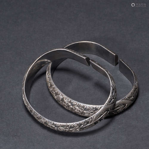 A pair of pure silver Chinese Qing Dynasty bracelets