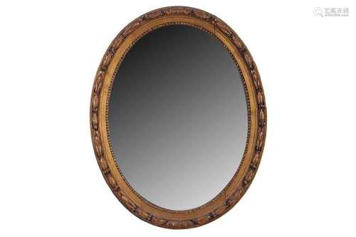 A GEORGE III STYLE OVAL GILTWOOD MIRROR, LATE 19TH CENTURY