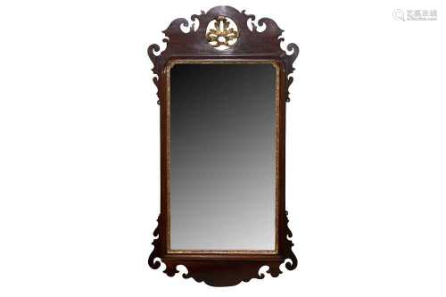 A GEORGIAN STYLE FRET CARVED WALL MIRROR