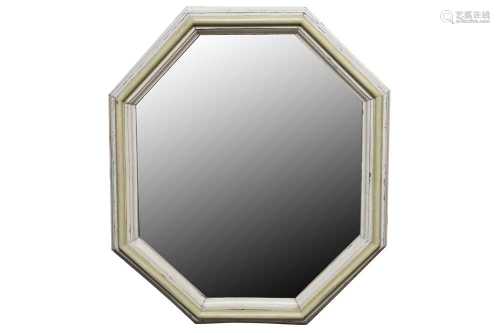 AN OCTAGONAL OAK MIRROR