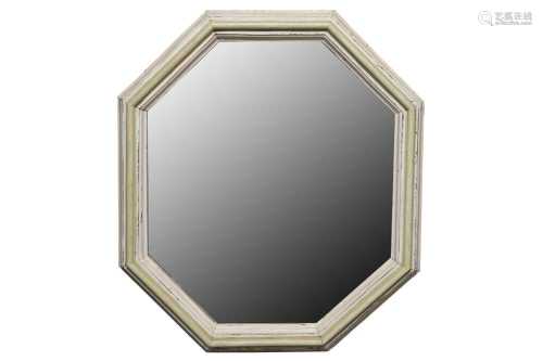 AN OCTAGONAL OAK MIRROR