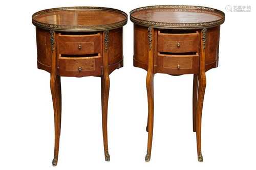 A PAIR OF FRENCH WALNUT AND BURR ELM OVAL BEDSIDE TABLES