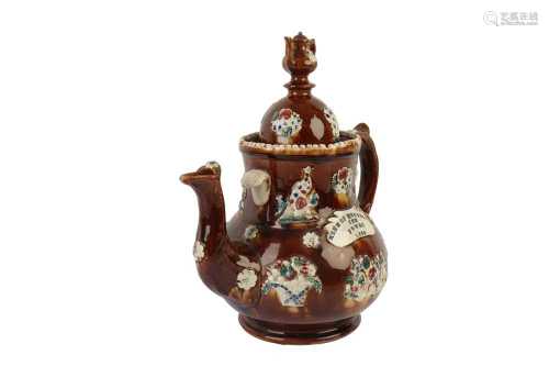 A VICTORIAN TREACLE GLAZED BARGEWARE TEAPOT