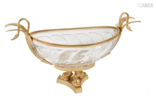 A LARGE OVAL GILT METAL AND GLASS TAZZA, IN THE EMPIRE TASTE...