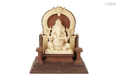 λ AN INDIAN IVORY SCULPTURE OF GANESH, LATE 19TH/EARLY 20TH ...