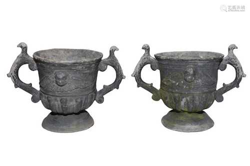 A PAIR OF 19TH CENTURY TWIN HANDLED LEAD PLANTERS