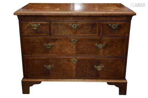 A GEORGE II AND LATER WALNUT AND OAK CHEST OF DRAWERS