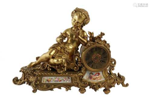 A FRENCH GILT BRONZE AND SEVRES STYLE PORCELAIN MANTEL CLOCK...