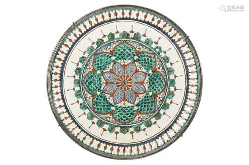 A PERSIAN TIN GLAZED EARTHENWARE PLATE