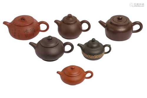 A RED YIXING TEAPOT AND COVER, 20TH CENTURY