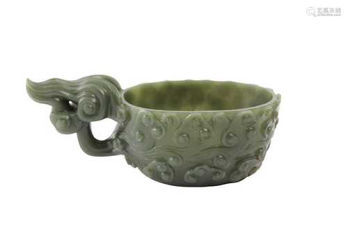 A CHINESE SPINACH-GREEN JADE ARCHAISTIC POURING VESSEL.