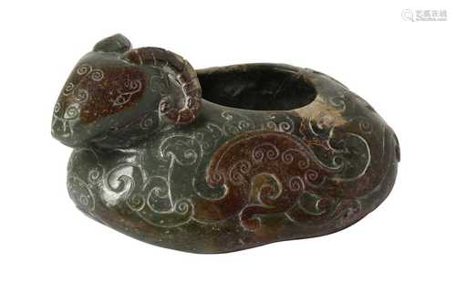 A CHINESE GREEN JADE 'RAM' WASHER