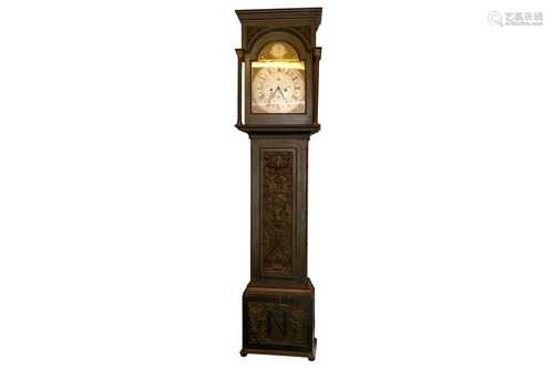 A MID 19TH CENTURY STAINED AND CARVED OAK LONGCASE CLOCK